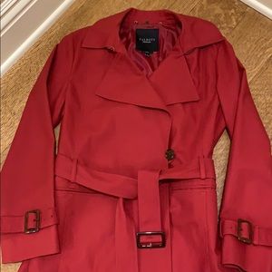 Red Talbots trenchcoat.